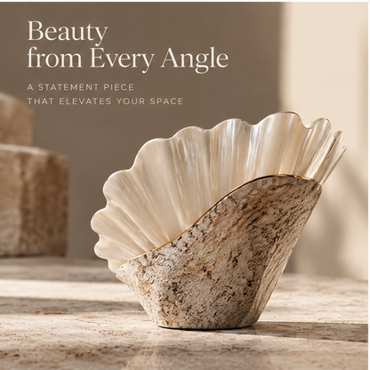Close-up of pearlescent shell folds and fine gold-toned edging