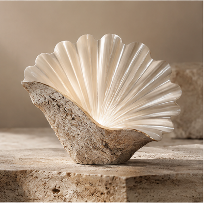 Fan-shaped shell decor with a pearlescent ivory interior and textured beige exterior